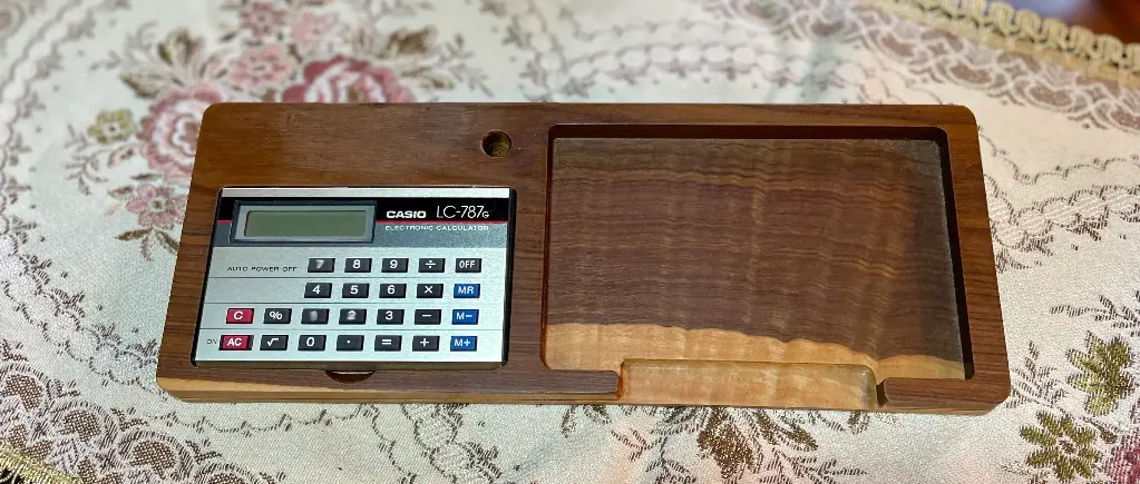 Calculadora y porta notas
