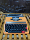 Máquina de escribir Silver Reed color naranja