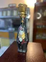 Dispensador de licor hombre con sombrero de copa