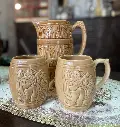 Juego de jarra y dos vasos de cerveza en cerámica
