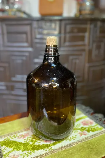 [TES-A-00000000206] Botella antigua de vidrio con tapa corcho